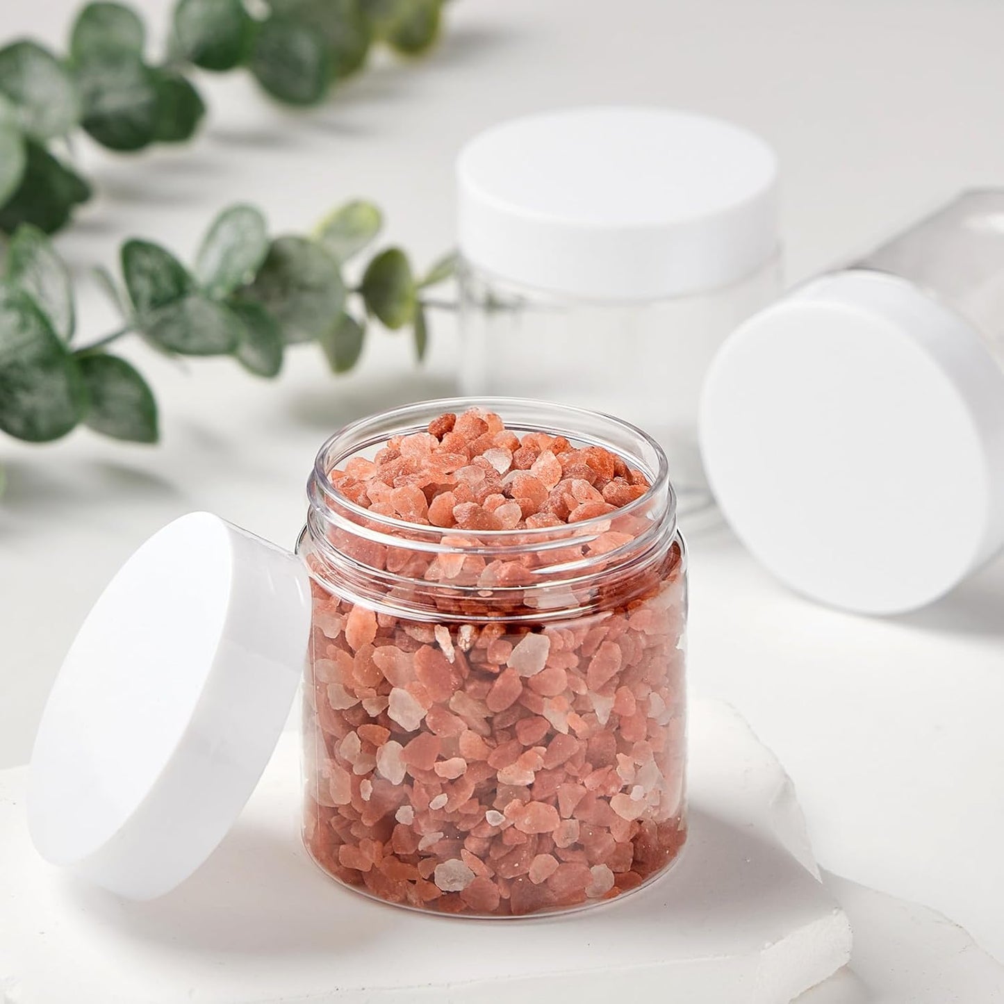 TUZAZO 24 Pack 2 Oz Small Plastic Container Jars with Lids and Labels BPA Free, Empty Round Clear Cosmetic Containers Plastic Slime Jars for Lotion, Cream, Ointments, Samples, Travel Storage (24)