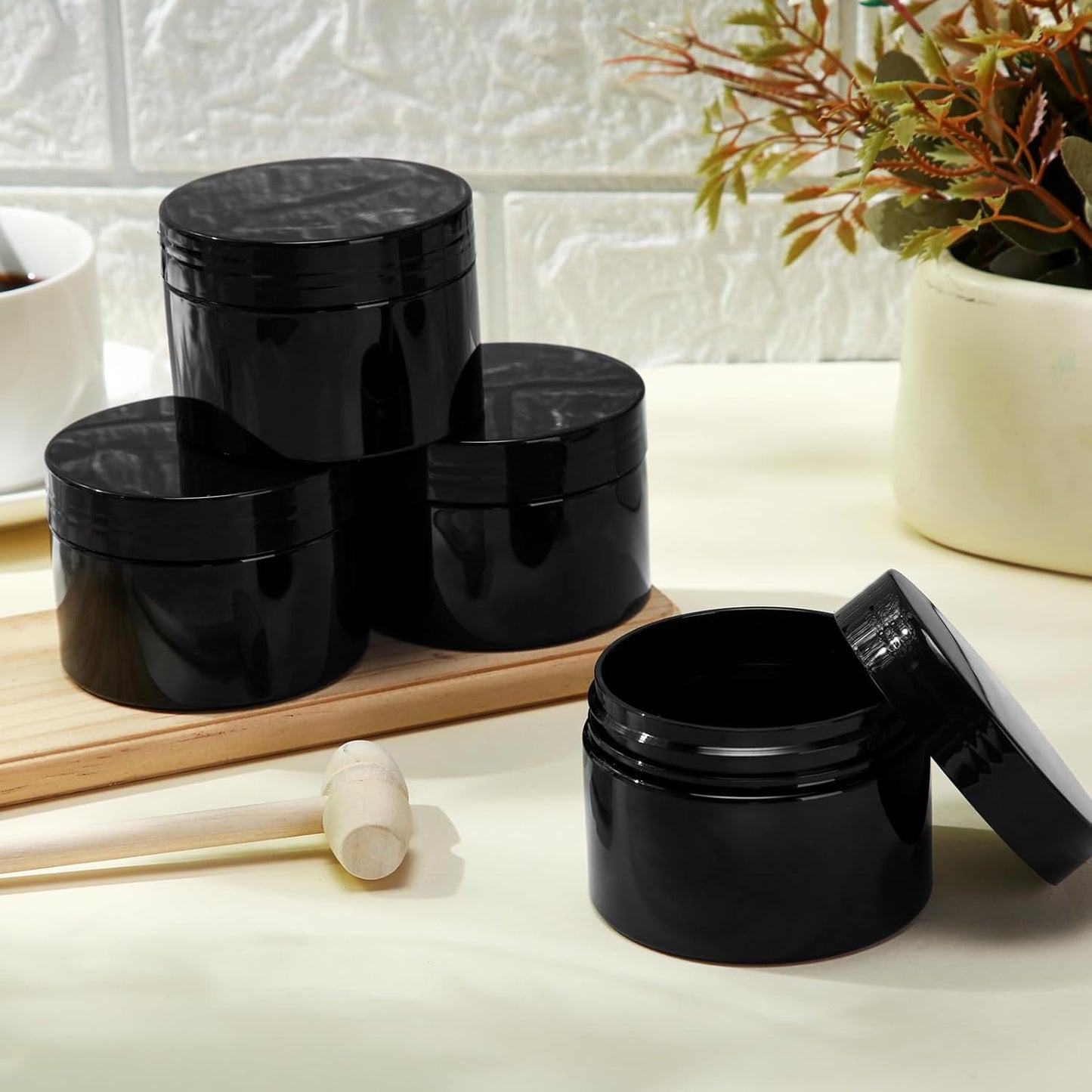 SATINIOR 24 Pieces Empty Clear Plastic Jars with Lids Round Storage Containers Wide Mouth for Beauty Product Cosmetic Cream Lotion Liquid Butter Craft and Food(Black,4 oz)